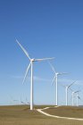 Wind farm against blue sky during daytime — Stock Photo