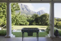 Table soccer on terrace of  luxury modern house — Stock Photo