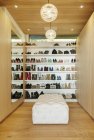 Modern walk-in closet with shoes on shelves — Stock Photo