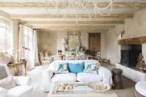 Living and dining area in rustic house — Stock Photo