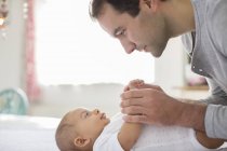 Father adoring baby boy — Stock Photo