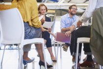 Business people meeting in circle at modern office — Stock Photo