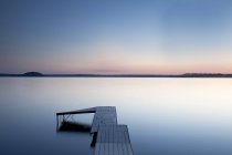 Dock over still lake, Saratoga Lake, New York, United States — Stock Photo