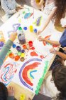 Students painting in classroom — Stock Photo