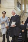 Judge and lawyer walking together through courthouse — Stock Photo
