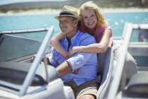 Older couple relaxing on boat — Stock Photo