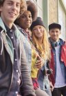 Happy young friends standing together — Stock Photo