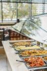 Lunch food salad bar in grocery store market — Stock Photo