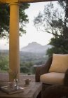 Wicker armchair on luxury patio — Stock Photo