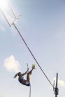 Pole jumper approaching bar — Stock Photo