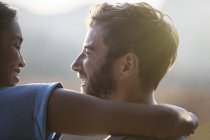Close up smiling couple hugging — Stock Photo
