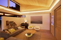 Illuminated living room indoors — Stock Photo