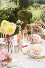 Table set for wedding reception outdoors — Stock Photo