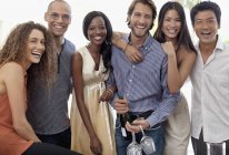 Young attractive Friends smiling together at party — Stock Photo