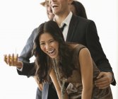 Young attractive Friends laughing at party — Stock Photo