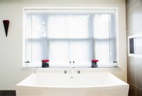 Sink and window in modern bathroom — Stock Photo