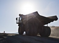 Silhouette of truck in quarry during daytime — Stock Photo