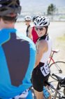 Cyclists talking before race — Stock Photo