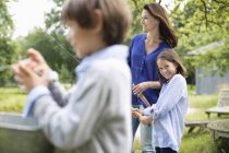 Family fishing together outdoors — Stock Photo