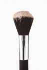 Close up of blush powder on makeup brush — Stock Photo
