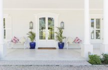 Entrance on porch of luxury house — Stock Photo