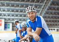 Portrait of track cyclist in velodrome — Stock Photo