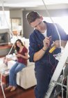 Skillful caucasian electrician working in home — Stock Photo