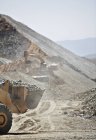 Diggers working in quarry during daytime — Stock Photo