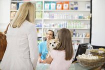 Owner bringing dog to veterinary surgery — Stock Photo