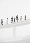 Business people walking along elevated walkway — Stock Photo