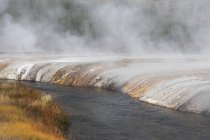 Mist over sand basin and river — Stock Photo