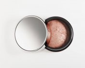 Close up of blush in jar — Stock Photo