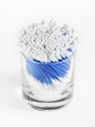 Close up of cotton swabs in jar on white background — Stock Photo