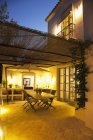 Illuminated patio of luxury villa — Stock Photo