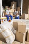 Movers sitting in moving van in driveway — Stock Photo