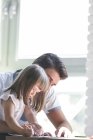 Father and daughter coloring — Stock Photo