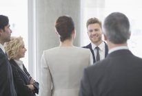 Business people talking in office — Stock Photo