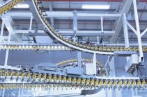 Printing press conveyor belts overhead — Stock Photo
