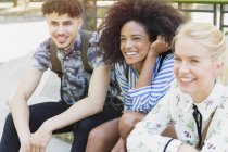 Smiling friends looking away — Stock Photo