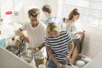 College student roommates sharing morning kitchen — Stock Photo
