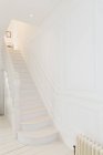 White staircase in modern house — Stock Photo