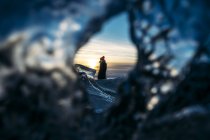 View of woman through hole in ice, Iceland — Stock Photo