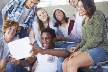 Teenage friends hanging out taking selfie with digital tablet — Stock Photo