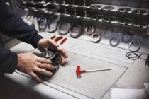 Worker assembling part in steel factory — Stock Photo
