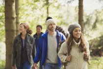 Friends hiking in woods during daytime — Stock Photo