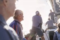 Scenic view of senior friends sailing together — Stock Photo