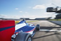 Formula one race car on sports track — Stock Photo