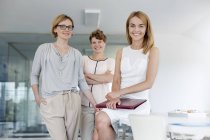 Portrait confident female architects in conference room — Stock Photo