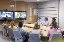 Gente de negocios en videoconferencia - foto de stock