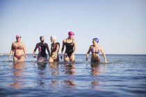 Female active swimmers at ocean outdoors — Stock Photo